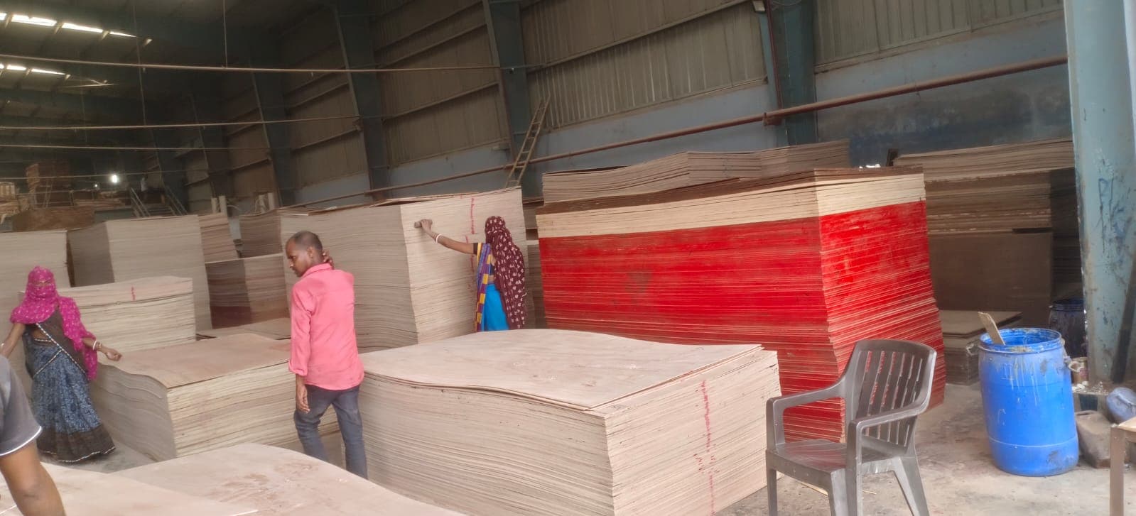 Plywood stacks in factory